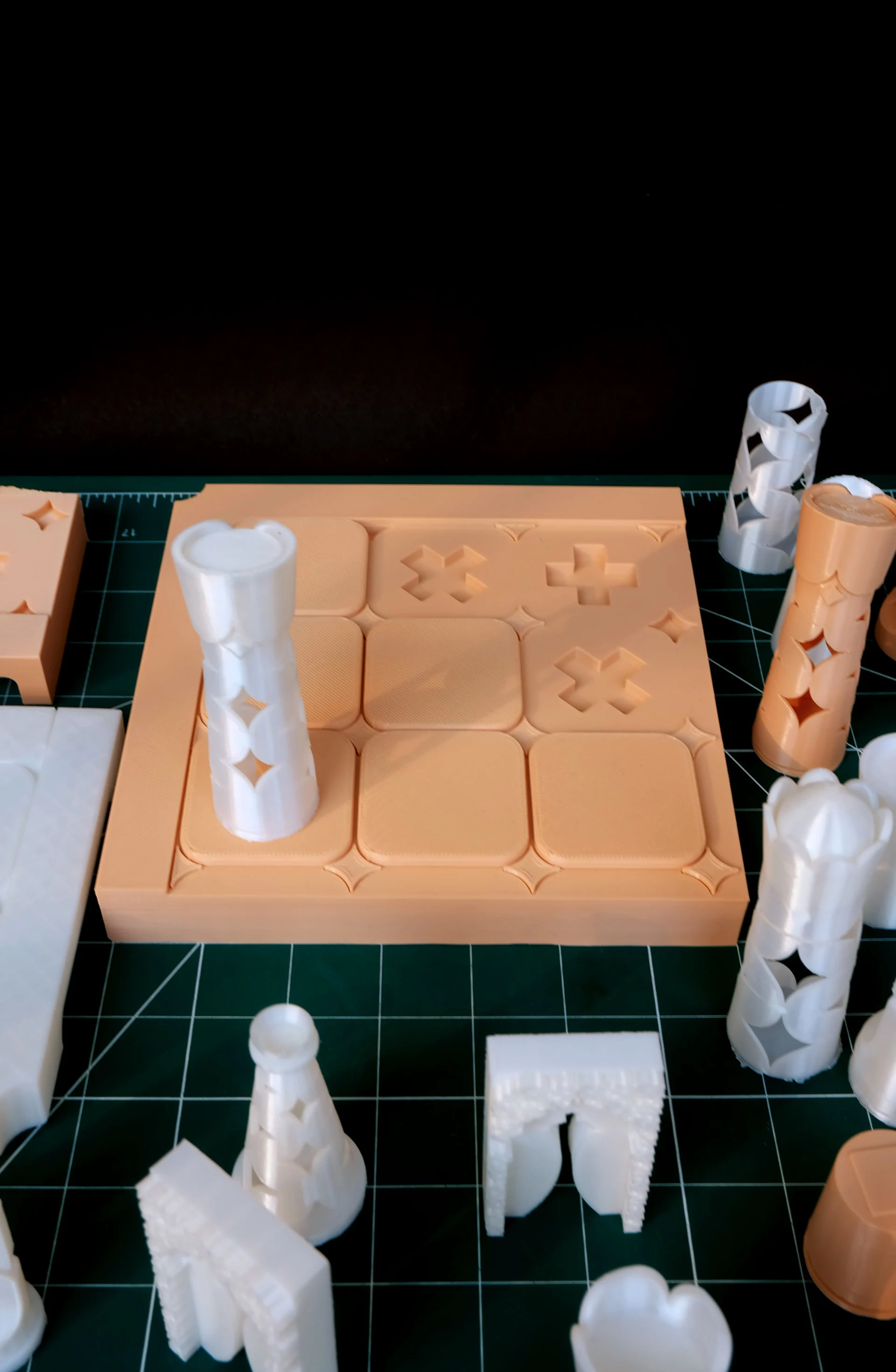 Printed board with a jali piece catching light